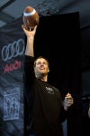 Tom Brady throws a football during the 2009 Audi Best Buddies Challenge. Photo by Gail Oskin/ WireImage.com.