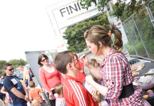 facepaint Following Saturday's kids triathlon, finishers took part in face painting in the finishers chute.