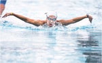 Learning other strokes can improve your freestyle stroke in a race. Photo: John Segesta