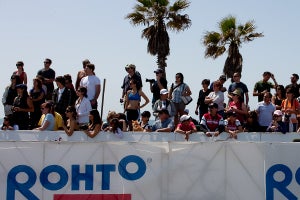 Friends and family axiously await the finish of their athlete. Photo: Paul Phillips