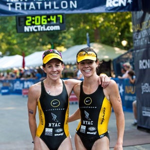 All smiles at the finish line of the NYC Triathlon. Photo: Justin Lee