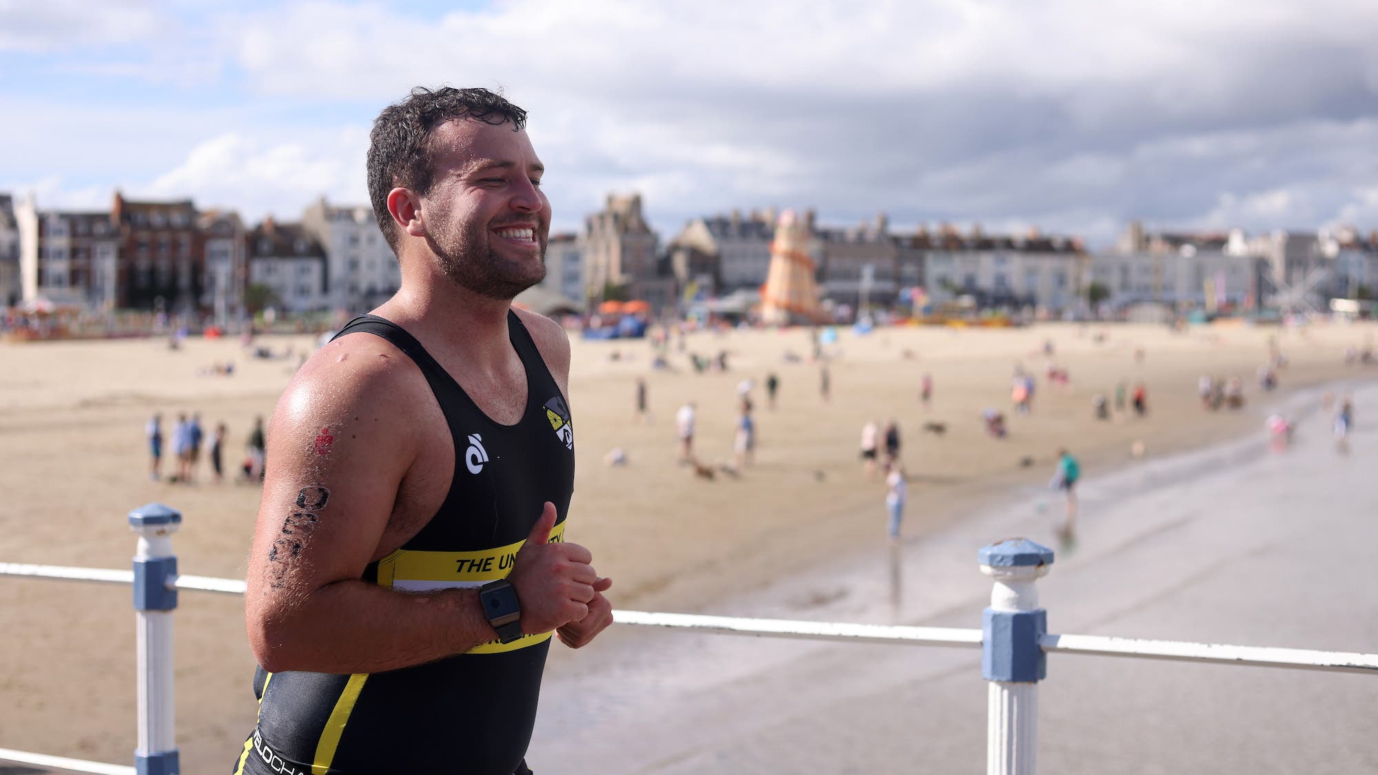 A triathlete races after using a ironman 70.3 training plan