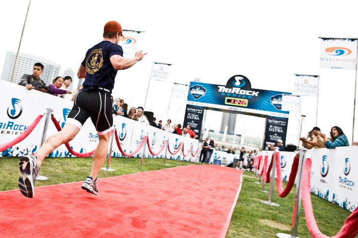 An athlete crosses the line at TriRock San Diego. Photo: John Segesta