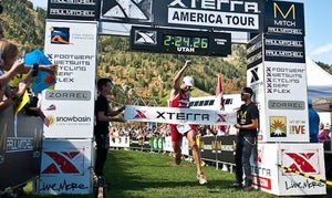 Lebrun jumps for joy winning the XTERRA USA Championship at Snowbasin Resort.