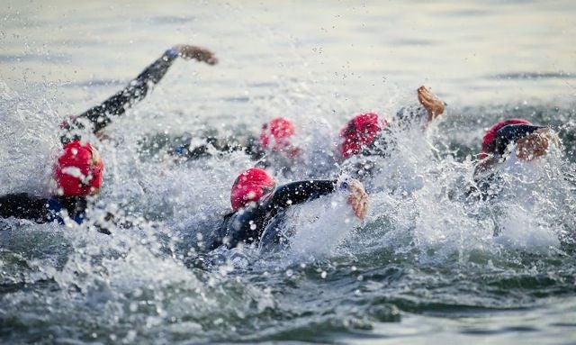 Should You Always Race In A Wetsuit? – Triathlete