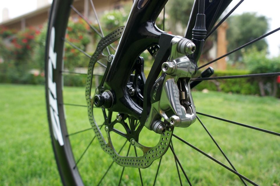SRAM's HRD brakes mount to a disc-compatible fork on the Specialized Roubaix. A bike must have caliper mount tabs to be compatible with this braking system.