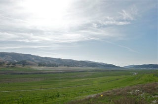 This is the former location of Lake San Antonio. It's completely dry and vegetation is starting to cover the ground. The run from the swim went through a trail cut in the brush. Photo: Aaron Hersh