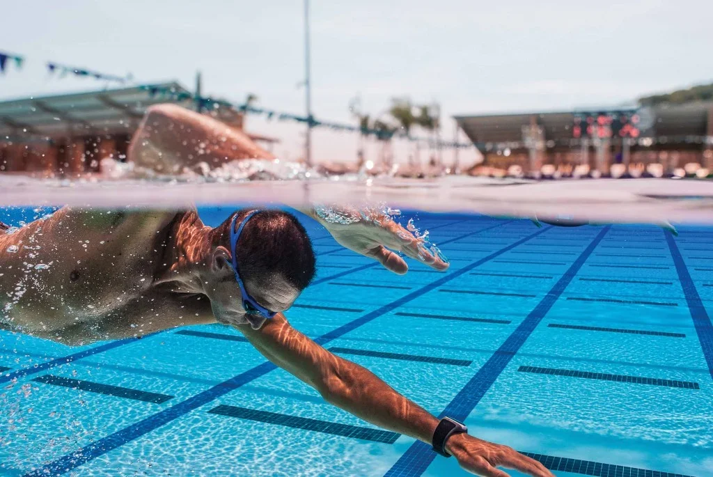 A swimmer demonstrates the catch phase of the swim stroke.