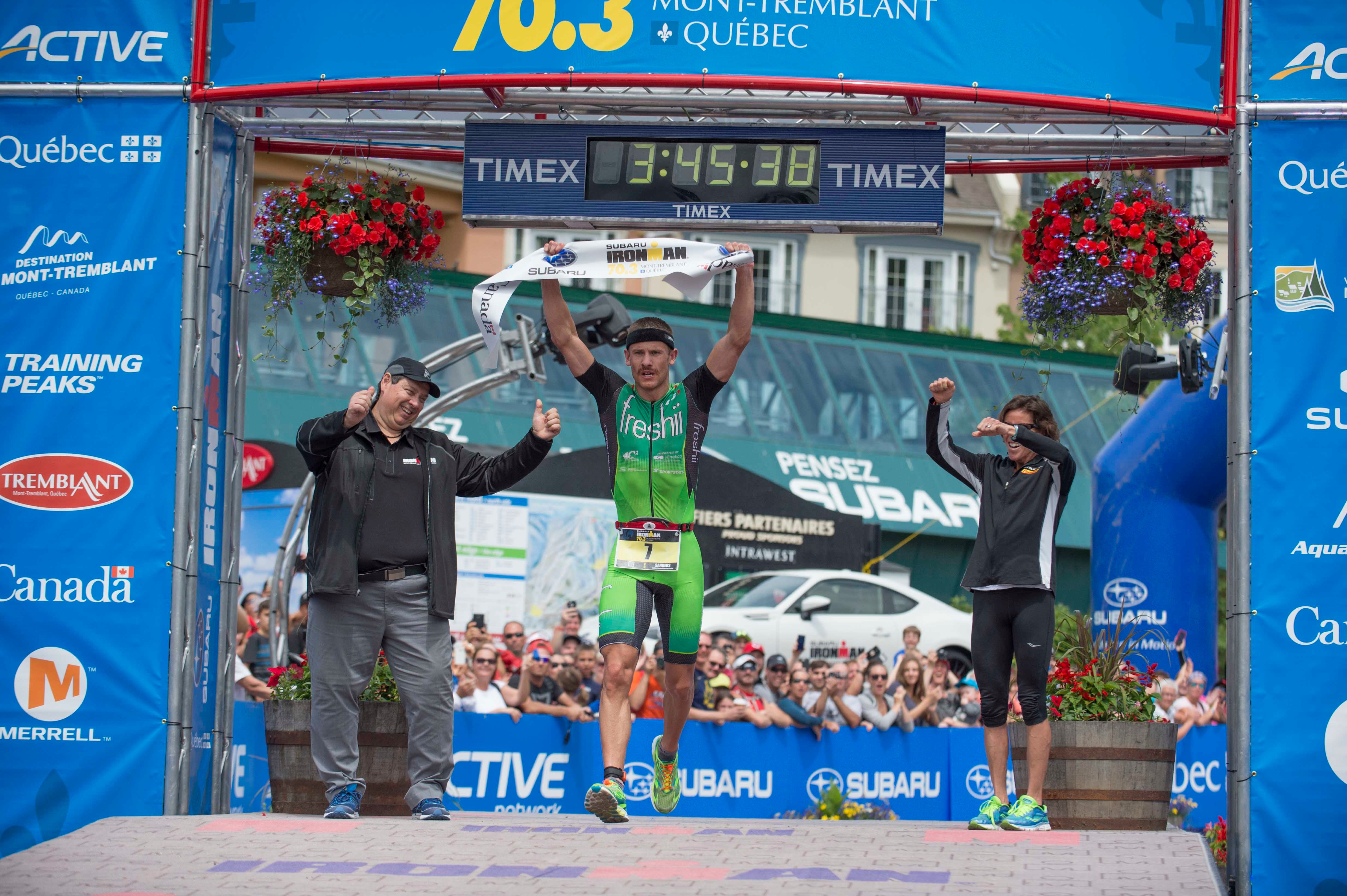 Canada's Lionel Sanders gets the victory. Photo: Julien Heon