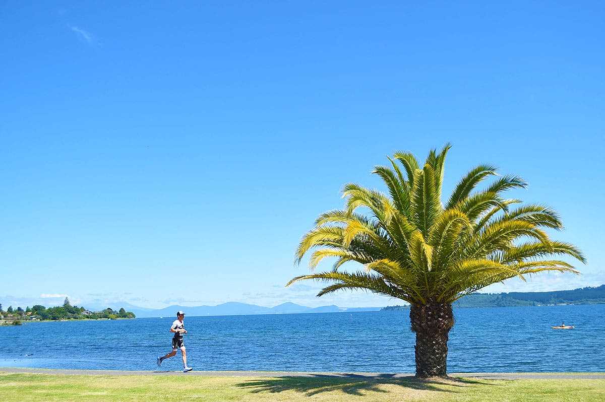 The stunning Ironman New Zealand run course in Taupo takes athletes through town three times and then along the beautiful Lake Taupo waterfront. Photo: Delly Carr