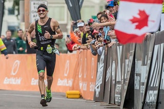 Lionel Sanders establishes a new Ironman world record of 7:44:29 at the 2016 Ironman Arizona triathlon. Photo: Paul Phillips/Competitive Image