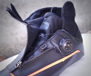 The high cuff and outer cover keep out the elements.