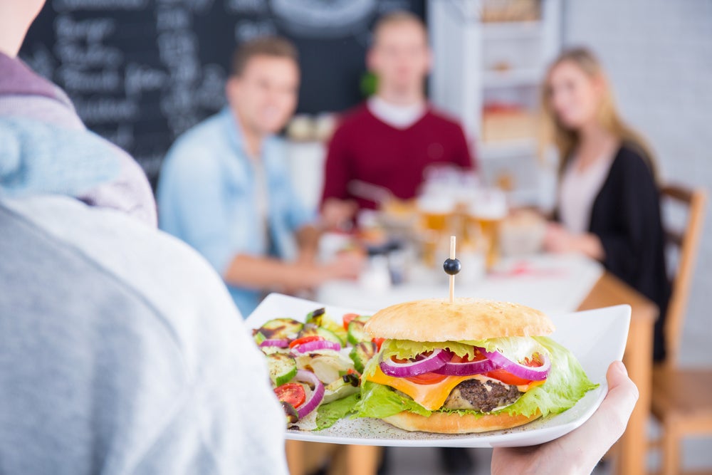 “If I get the side salad instead of fries, it cancels out the cheeseburger.” Photo: Shutterstock.com