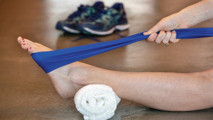 A photo of the ankle flex with resistance exercise, which will help with ankle flexibility.