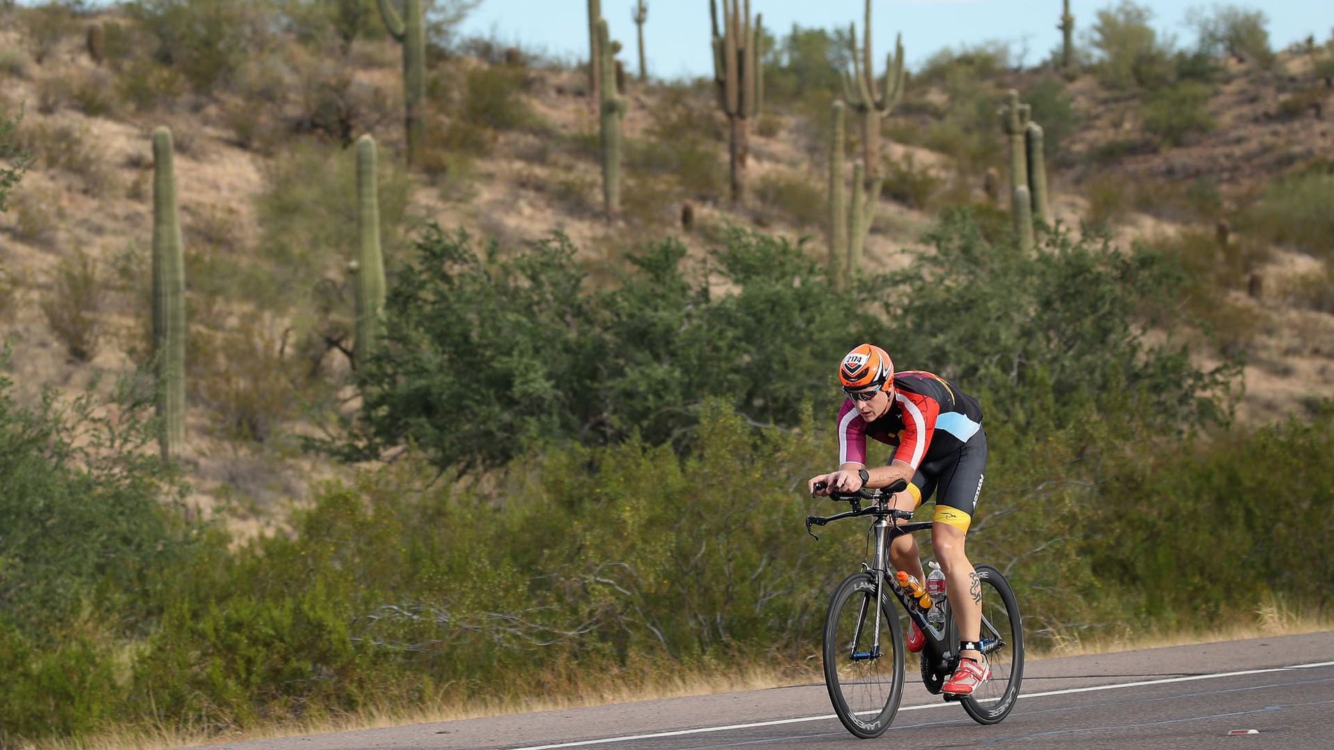 Age-group athlete Chad Fondren competes on the bike at Ironman Arizona, one of the best Ironman races in the USA