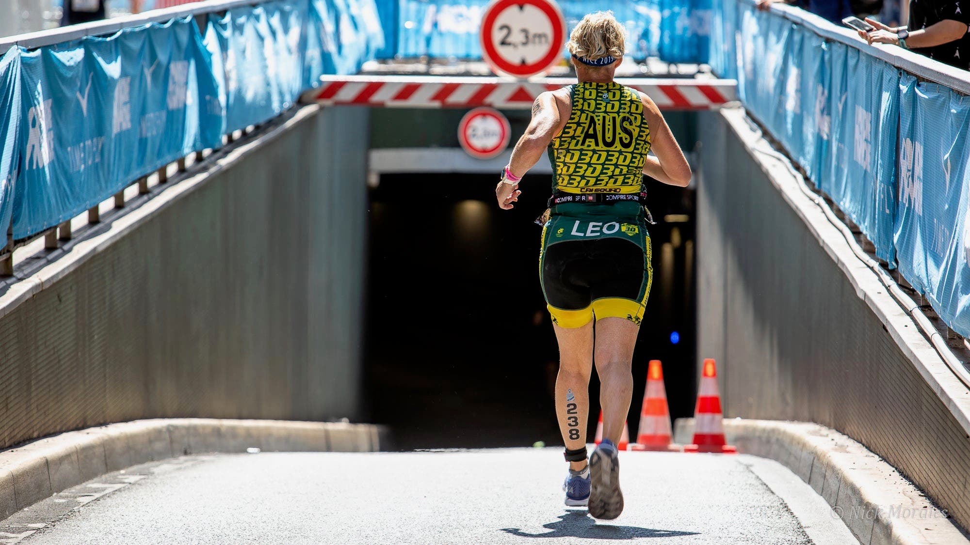 An athlete competes at a 70.3 distance triathlon.