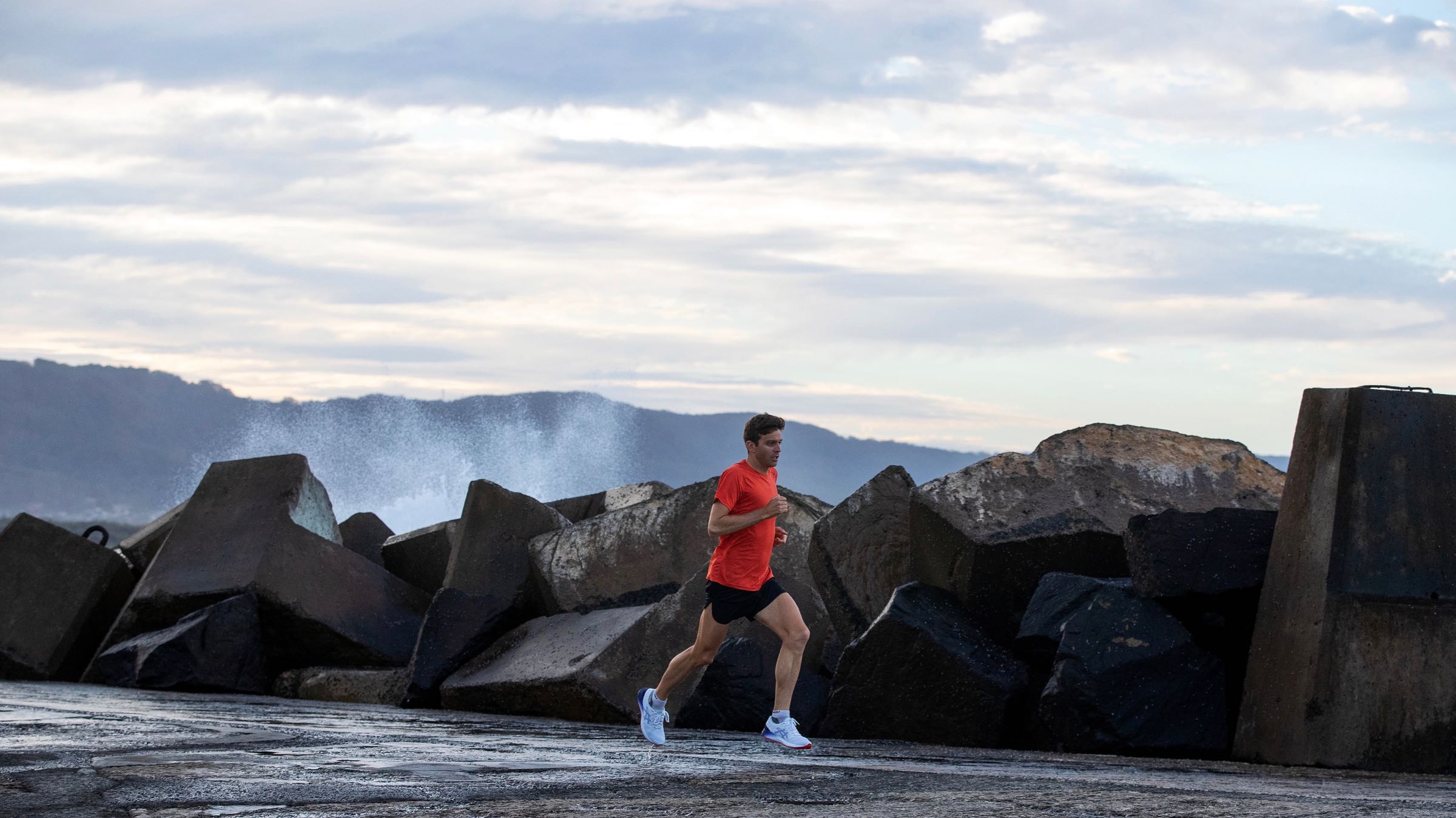 WOLLONGONG, AUSTRALIA - MAY 27: Australian triathlete Aaron Royle runs during a training session around Wollongong Harbour on May 27, 2020 in Wollongong, Australia. Royle usually spends eight months a year training and competing overseas, he is currently based in his hometown of Wollongong whilst the ITU World Triathlon Series is suspended due to the Covid-19 pandemic. (Photo by Cameron Spencer/Getty Images)