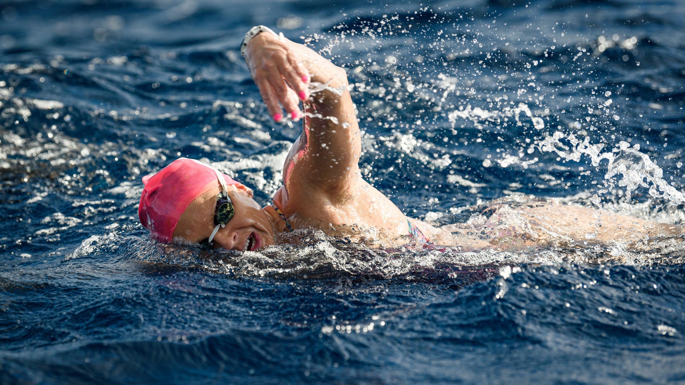 Lectie Altman swims in the open water.