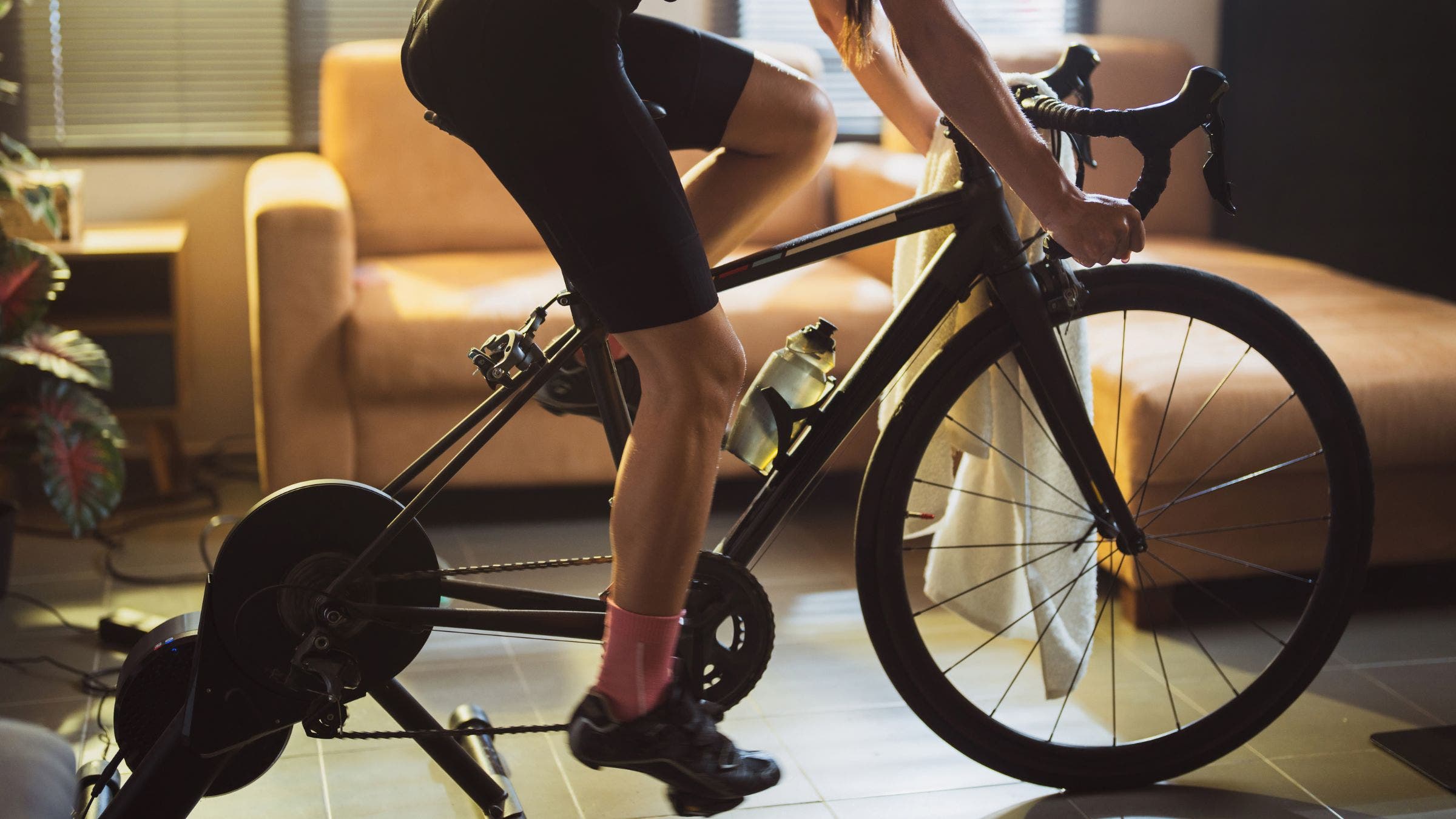 A cyclist triathlete does a Threshold Power Indoor Cycling Workout