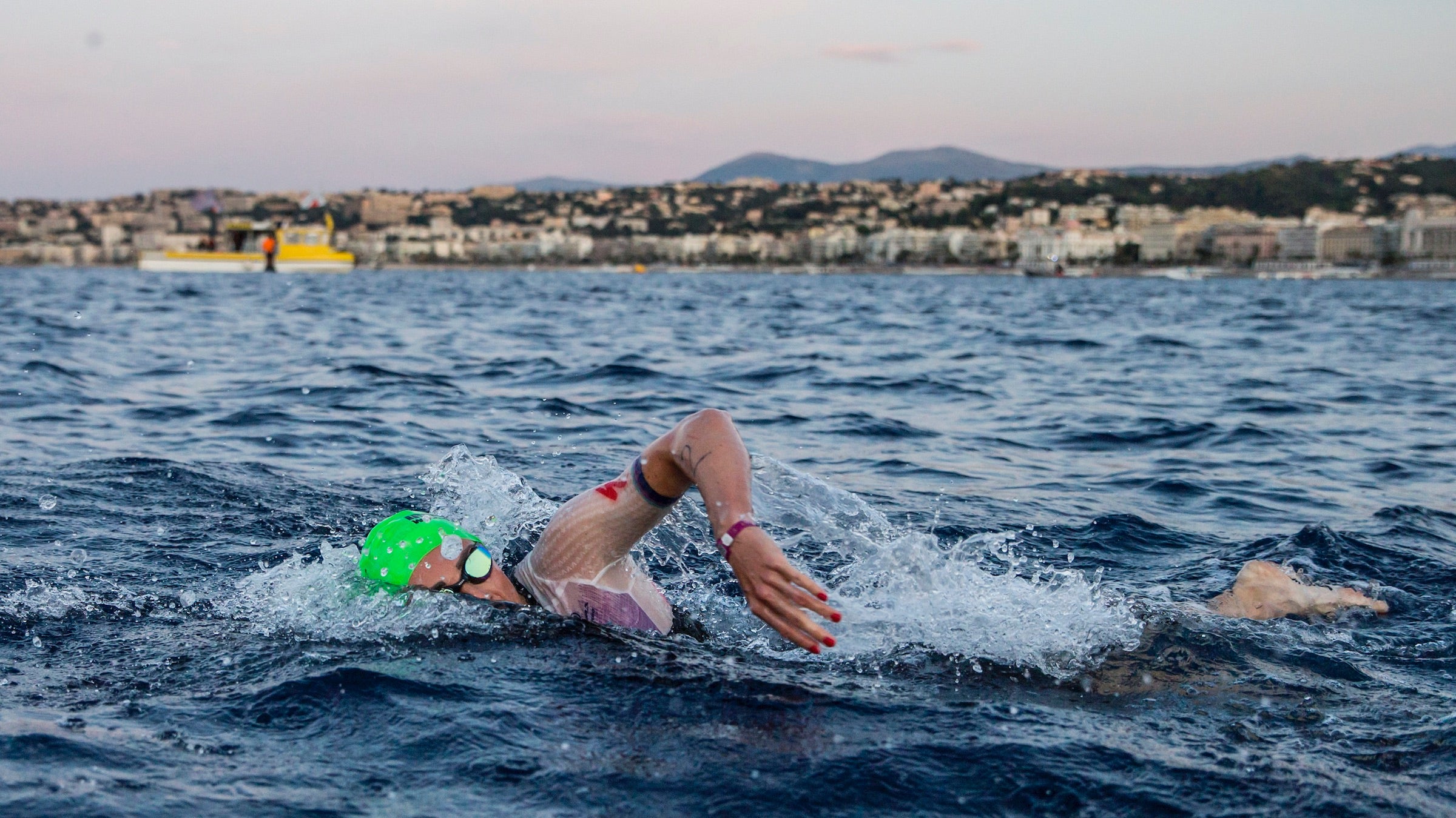 Lucy Charles-Barclay doing what she does best: off the front of the swim at the 70.3 World Championships.