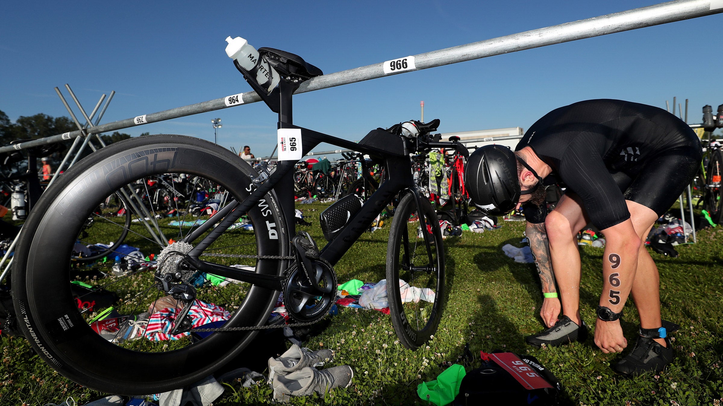 A bike is racked in triathlon transition