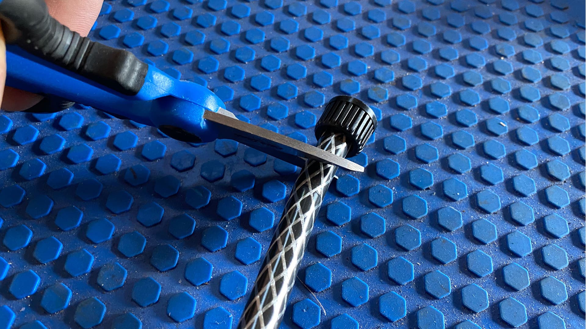 Portable shower hose cut