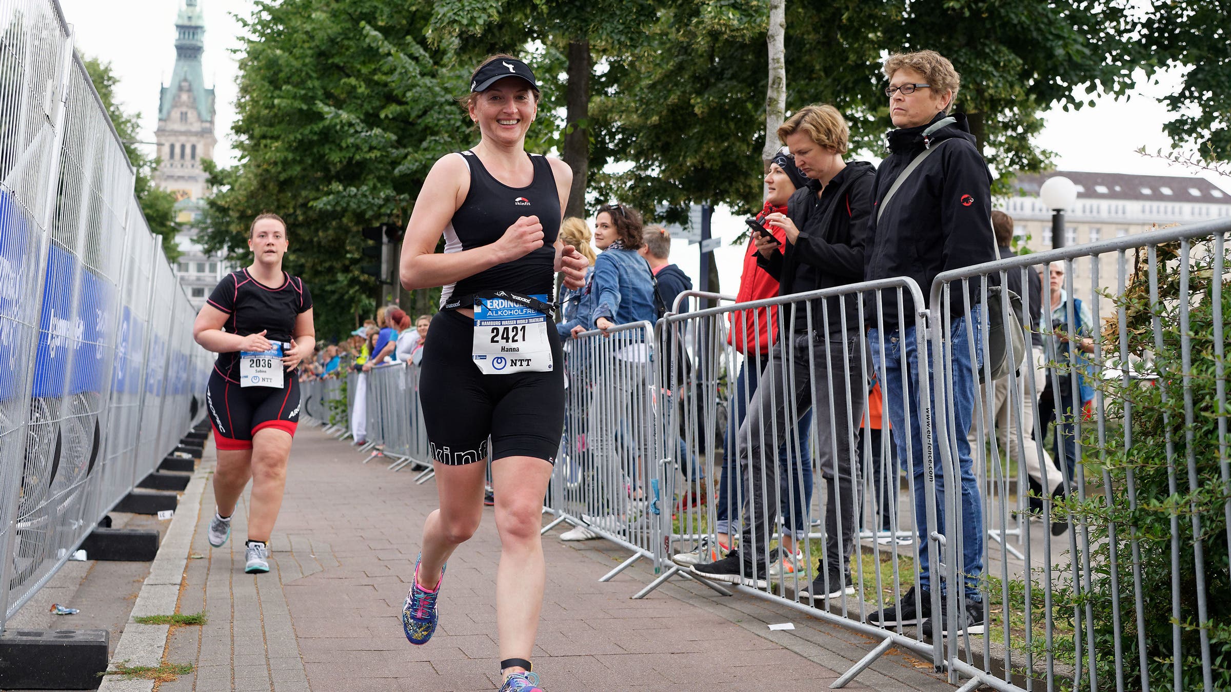 Runners nearing the finish line of a 5K race