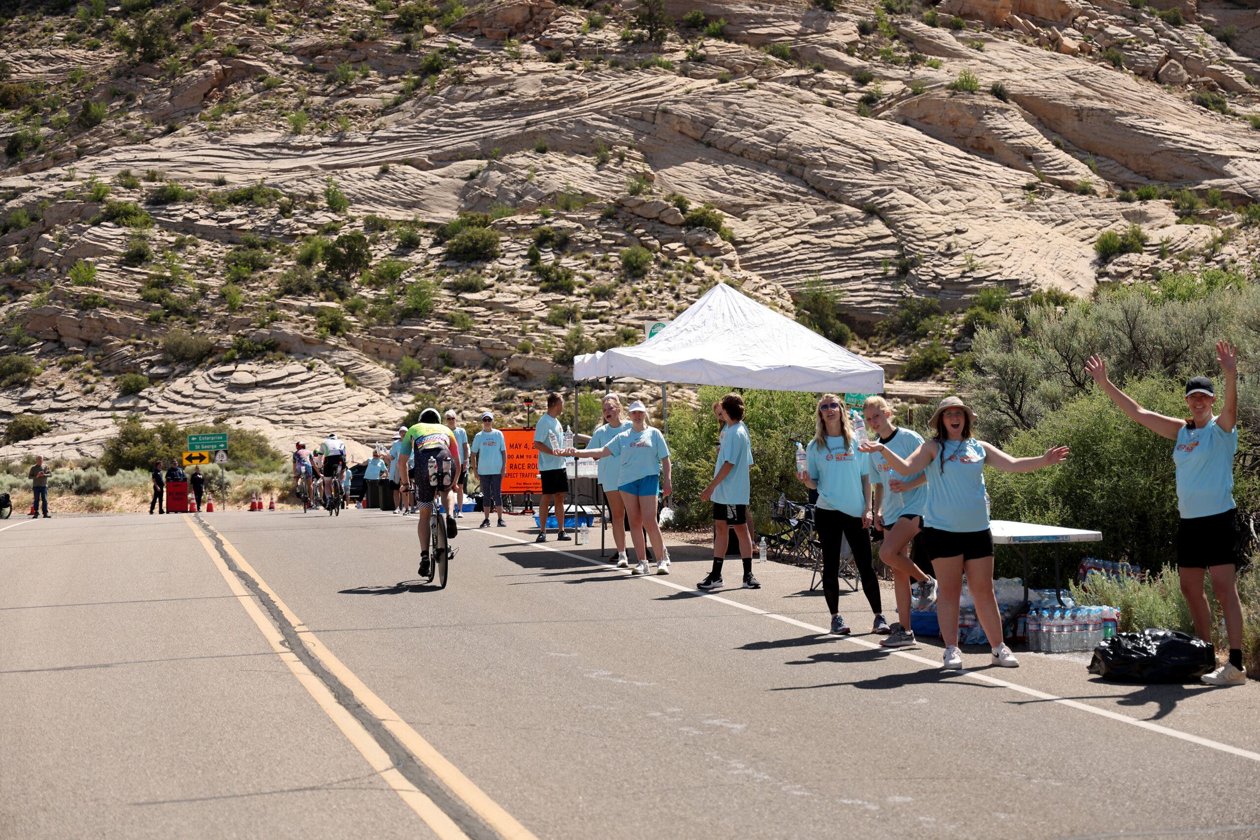 Take the guesswork out of aid station stops by calculating your carbohydrate, fluid, and electrolyte needs to develop a triathlon fueling plan.