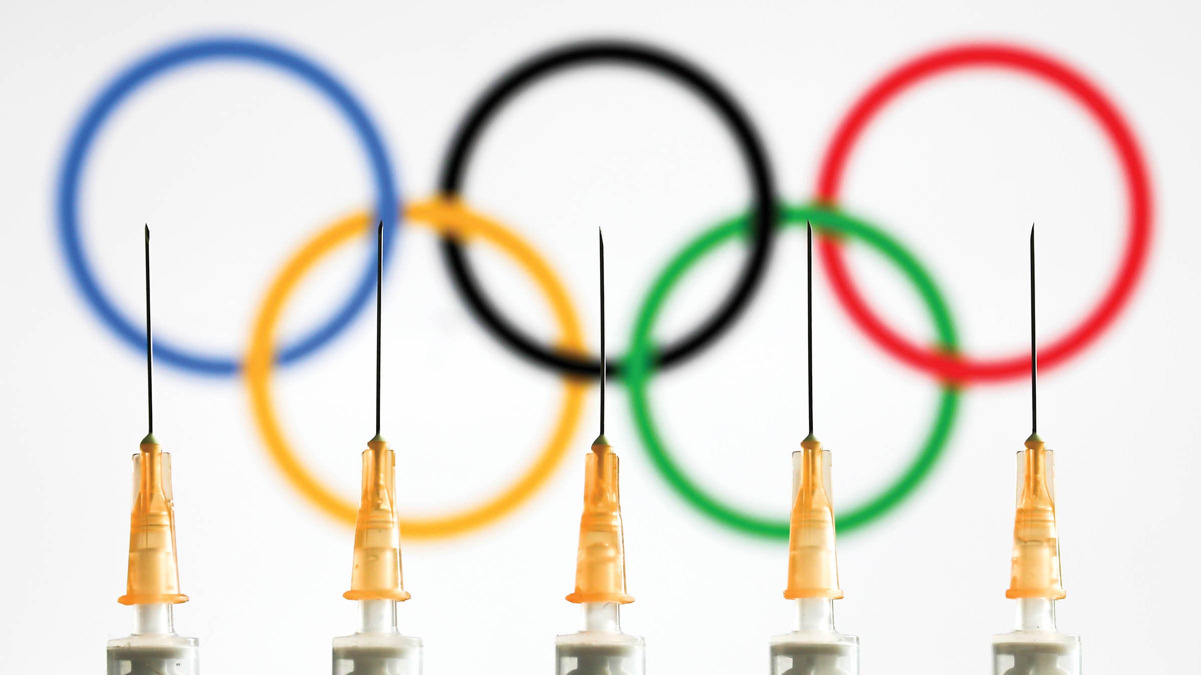 Medical syringes are seen with the Olympic rings