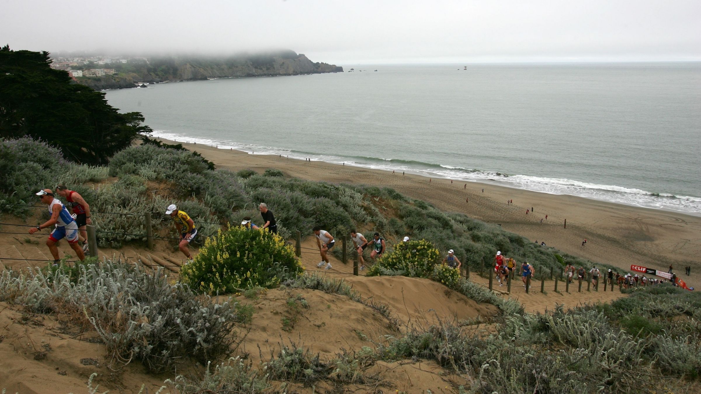 Runners climb the Escape from Alcatraz Triathlon Run Course