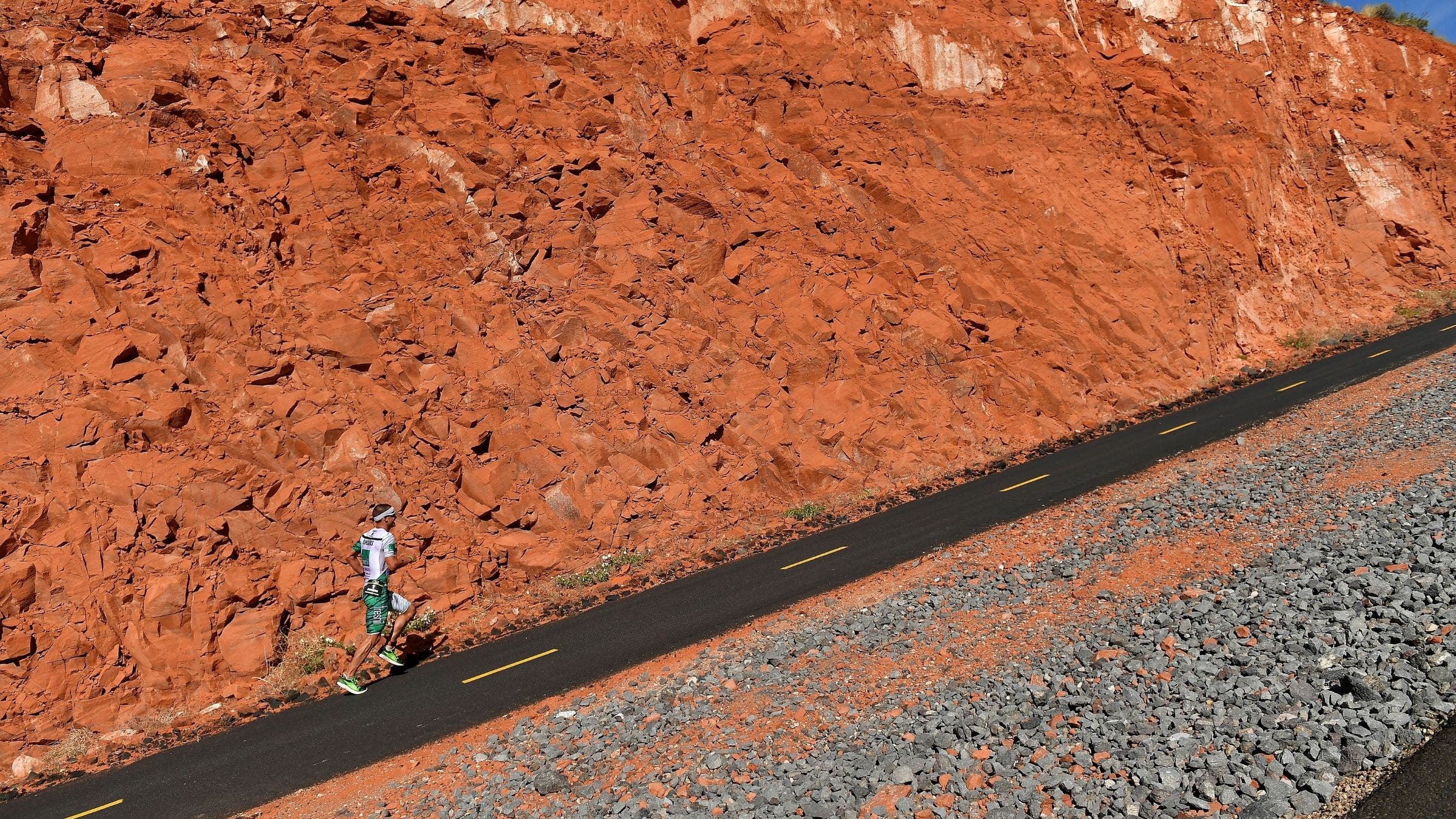 Lionel Sanders of Canada runs alone to win the IRONMAN 70.3 St George Utah on May 5, 2018 in St George, Utah.