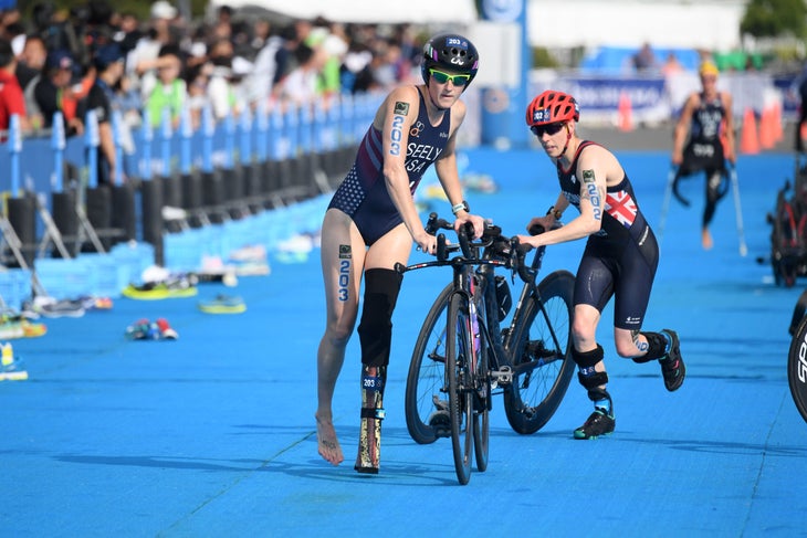 Paratriathlete Allysa Seely, who wears a prosthetic leg, exits the transition area of a triathlon.