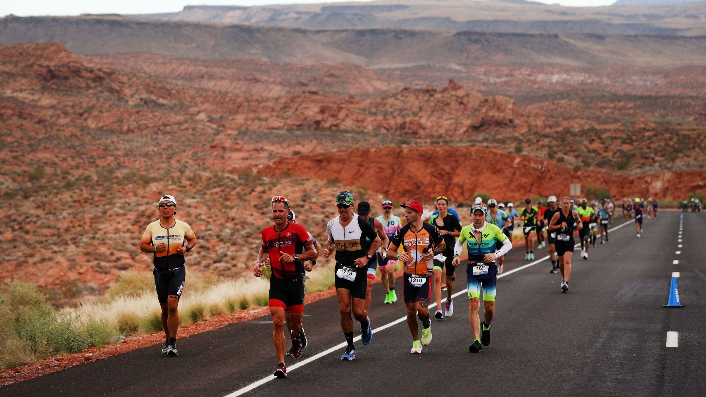 Triathletes compete in the running leg during the IRONMAN 70.3 World Championship on September 18, 2021 in St George, Utah.