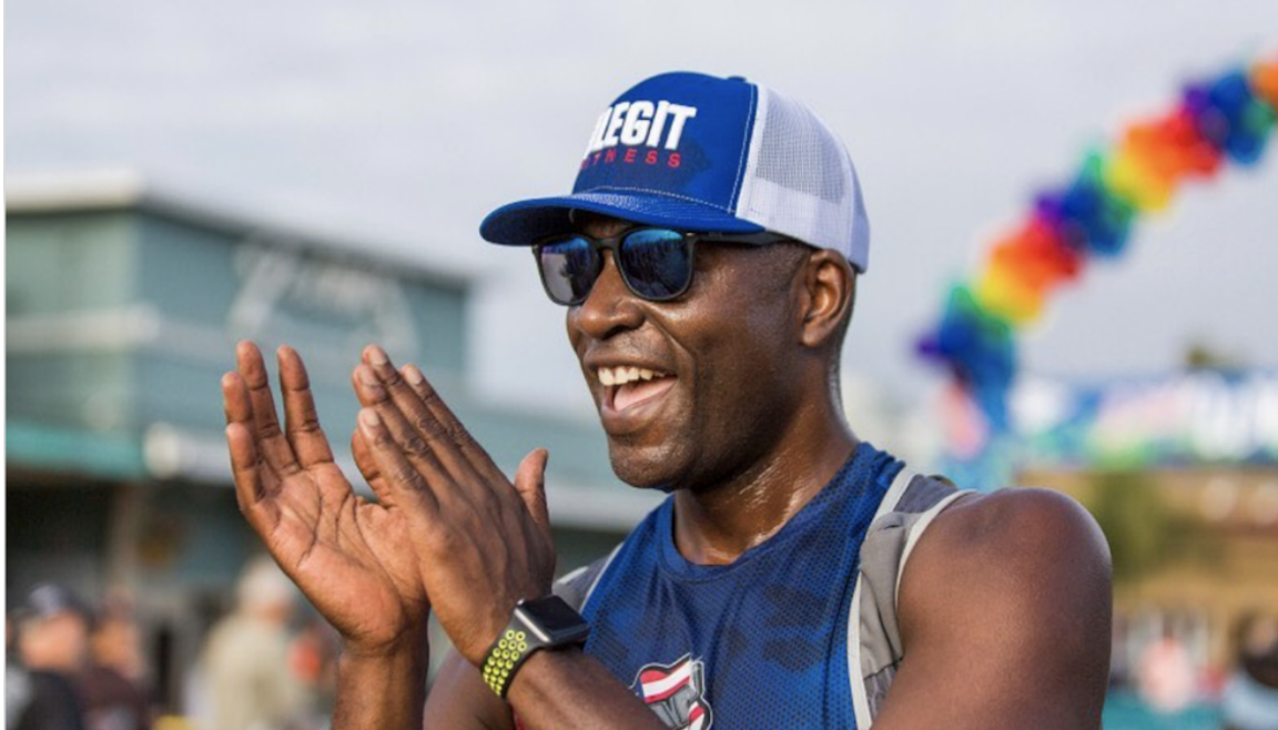 Man clapping his hands like he's a coach cheering for his athlete.