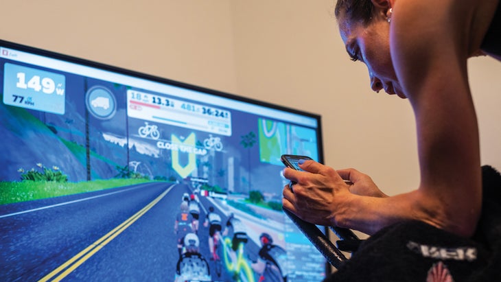 Athlete using an smart trainer connected to Zwift