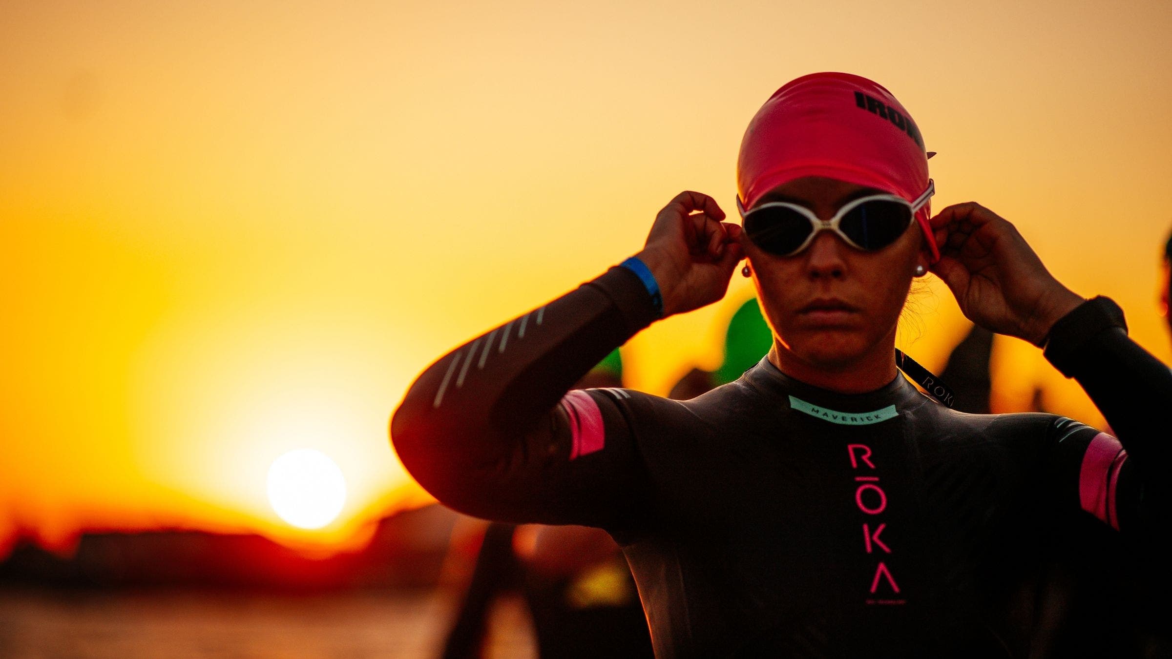 A triathlete makes her way through the Ironman 70.3 Texas swim course