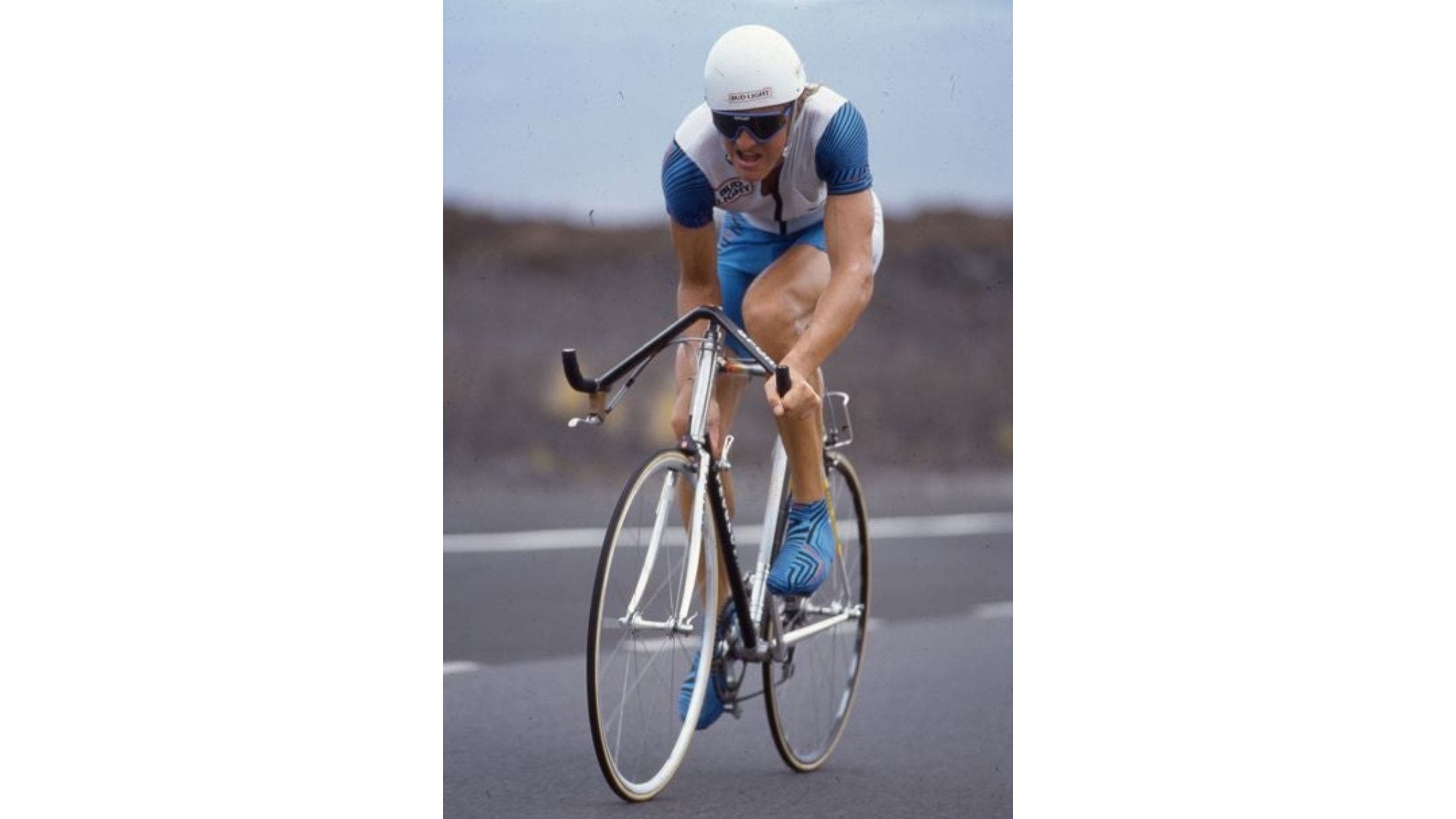 Scott Tinley lifts the hands and tucks the head - decades before it was cool.