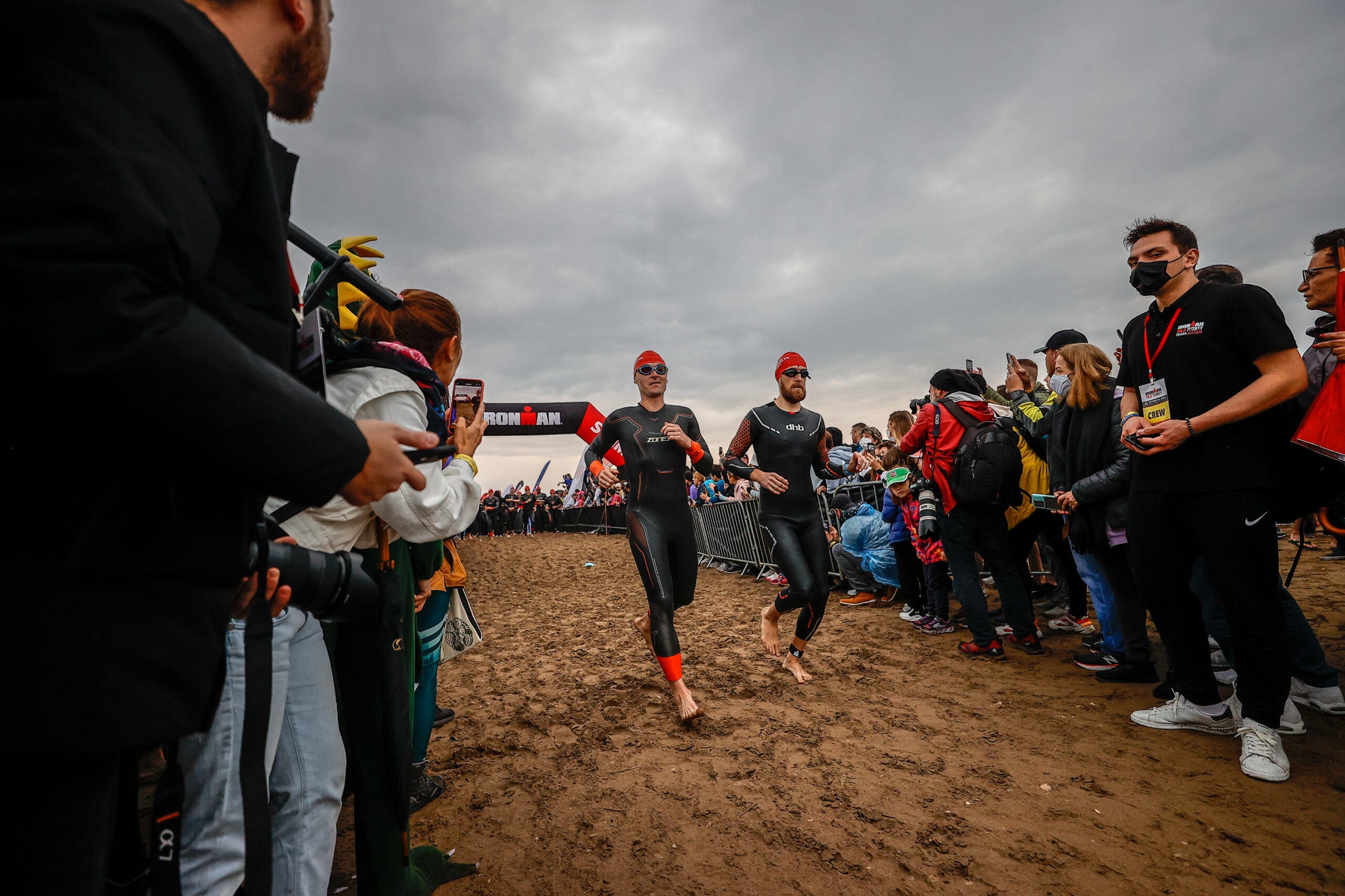 After training for a 70.3 triathlon, athletes begin their race.