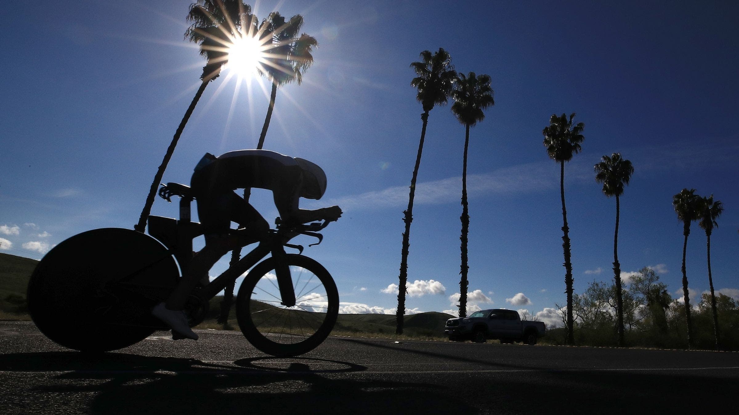An athlete rides the Ironman 70.3 Oceanside bike course.