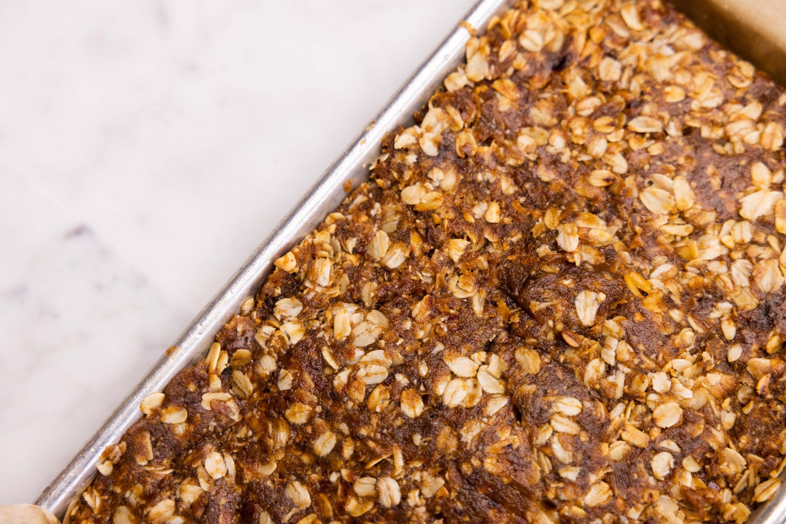 A pan of pre-workout snacks, oat bars