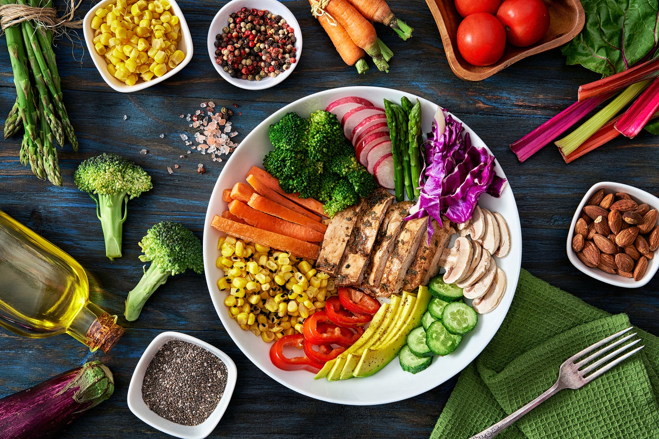 An assortment of fruits and vegetables associated with the alkaline diet for athletes.