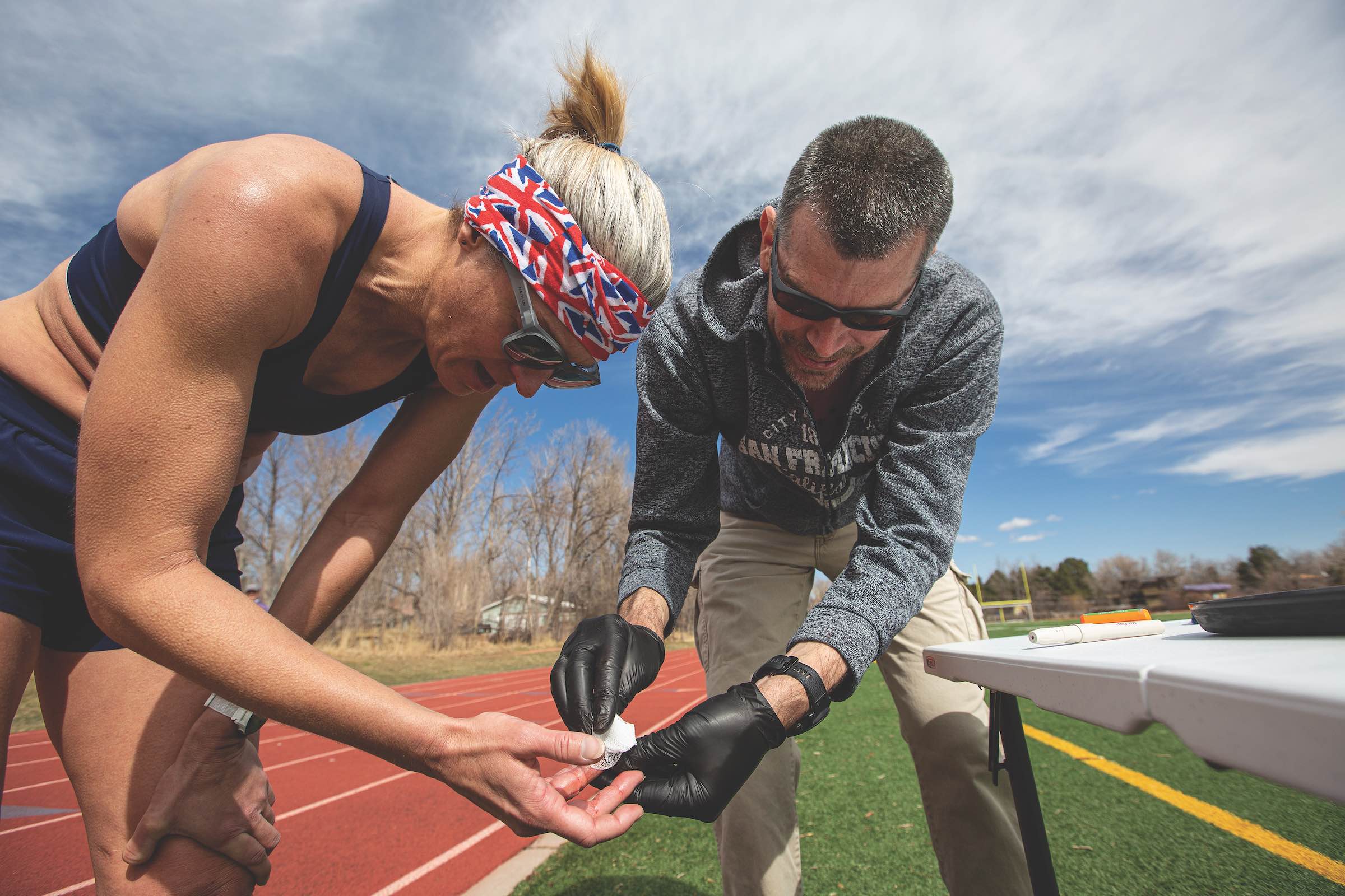 Alan Couzens tests Emma-Kate Lidbury's lactate during a track session. Lactate is coming to be seen as a must-have training metric as it provides a true assessment of internal stress.