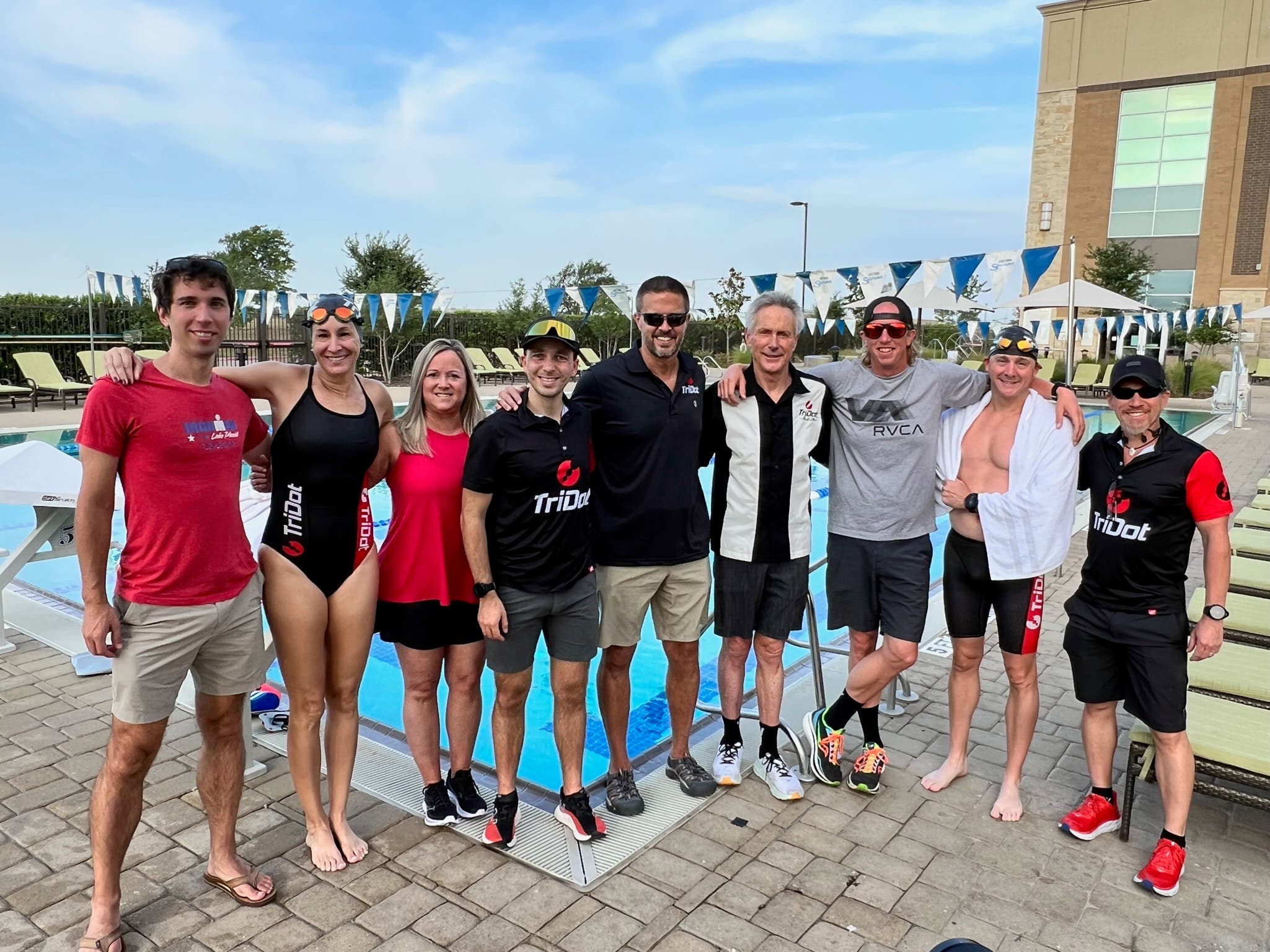 A group of triathletes with coach Mark Allen