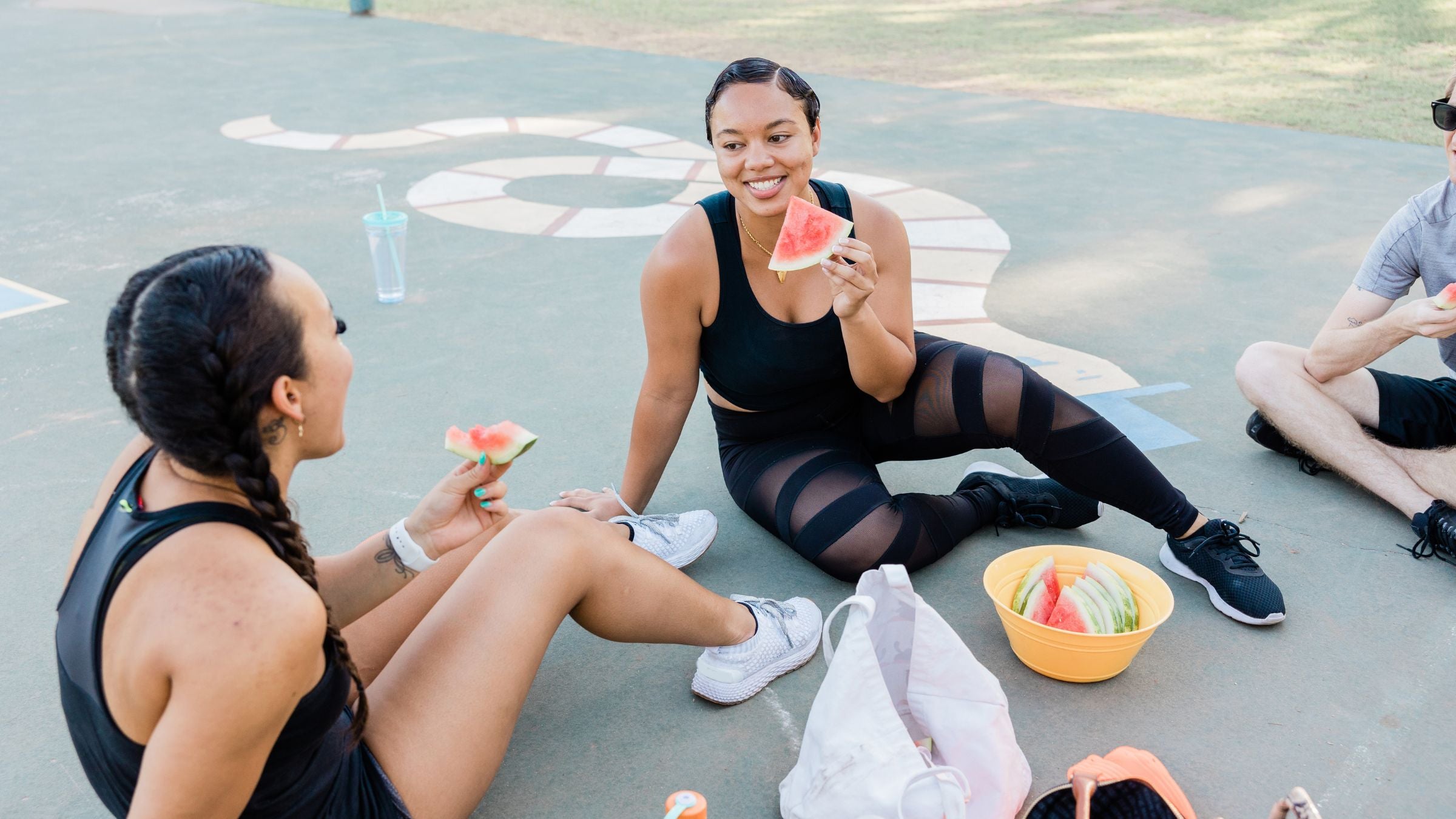 Athletes eat after a workout following a meal plan for triathletes