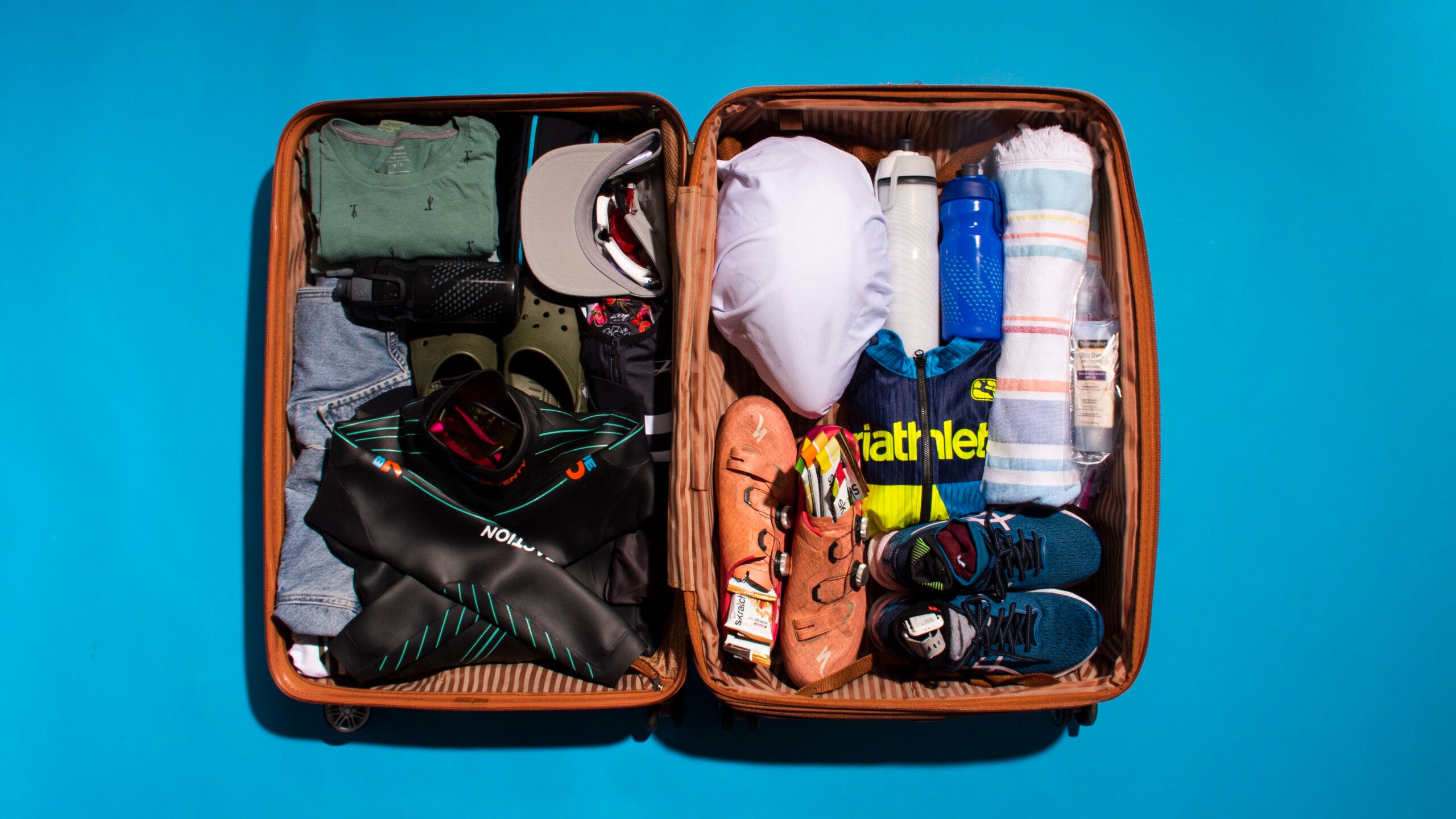 A packed suitcase for a triathlon