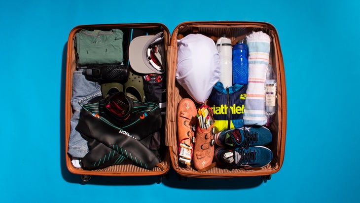 A packed suitcase for a triathlon