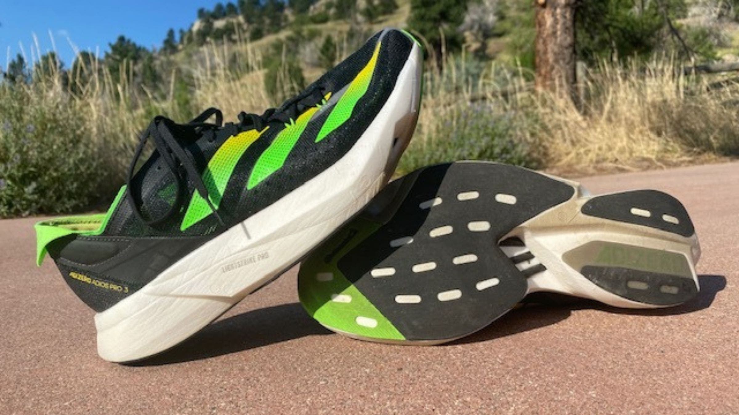 Adidas Adios Pro 3 running shoes during mountain road training