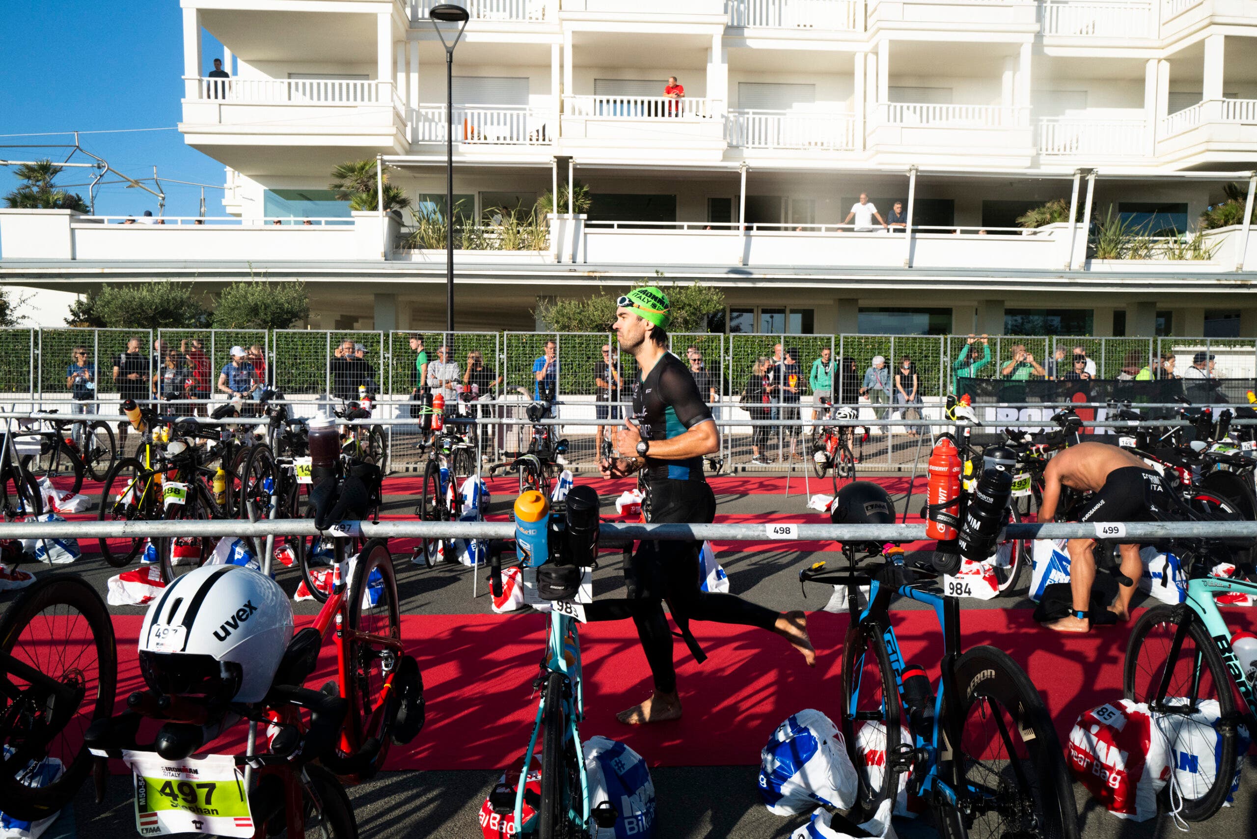 A triathlete makes the swim to bike transition