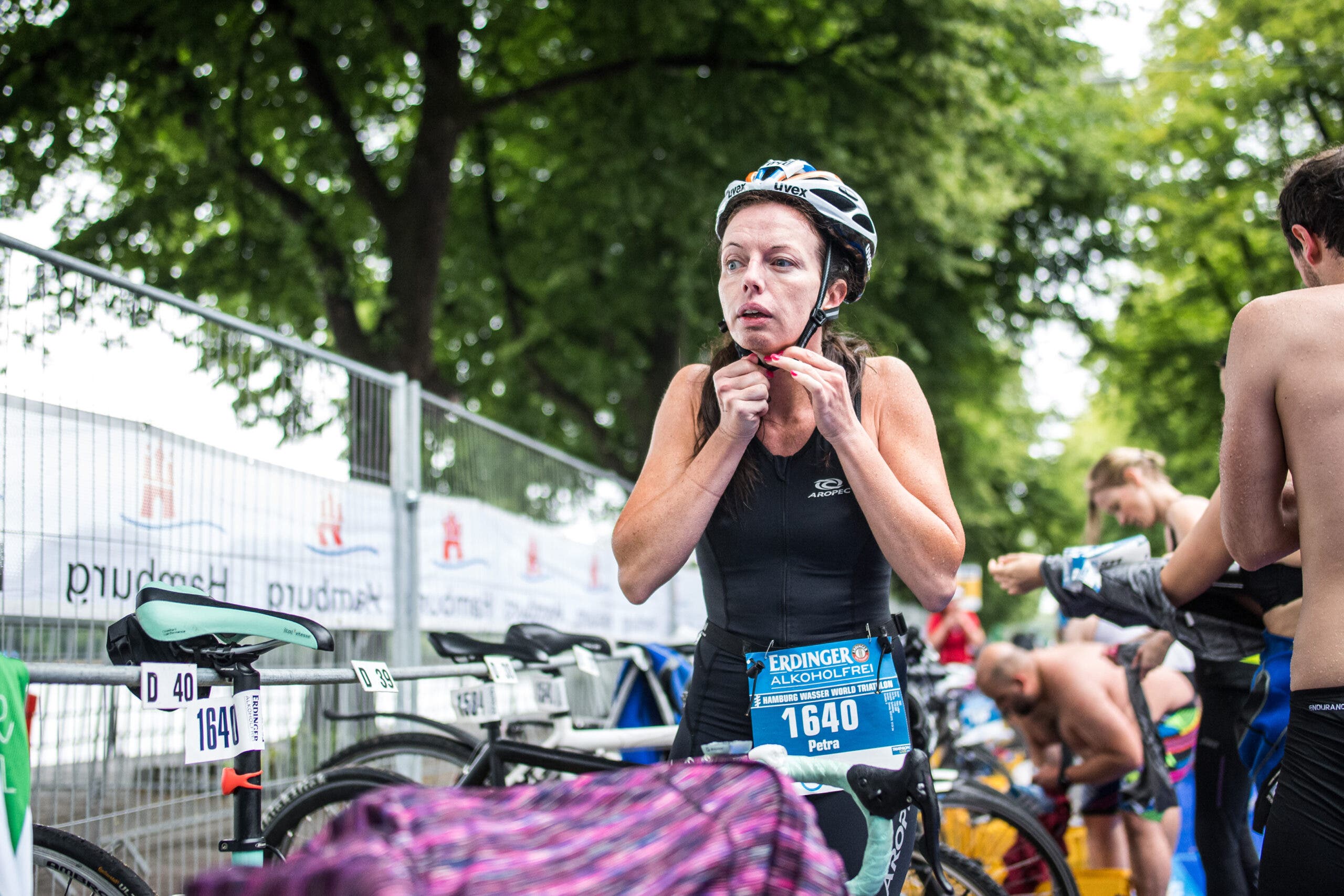 An athlete wears her number on the front for accurate timing.