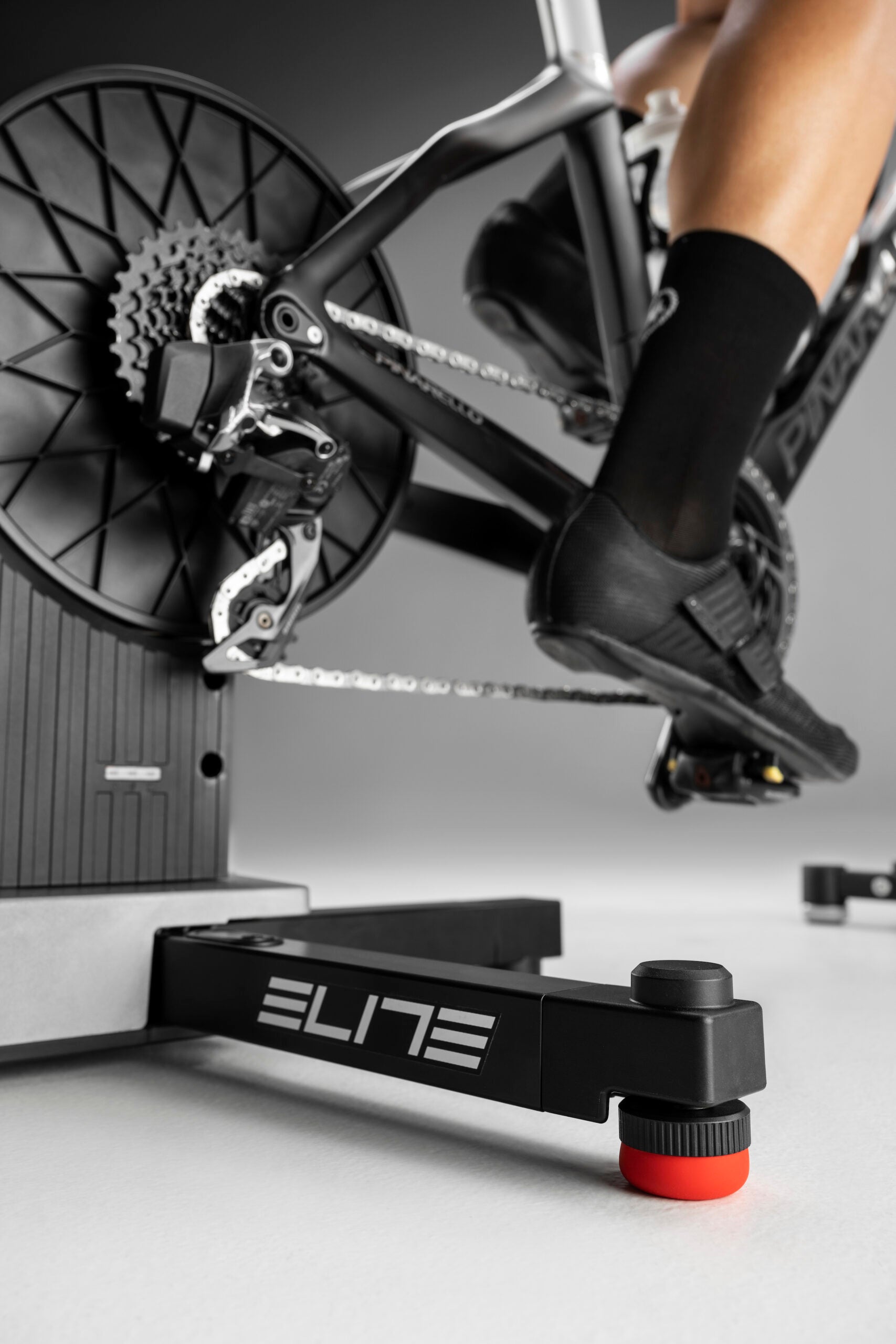 In our review, the Elite Justo smart trainer had flex feet for rocking motion